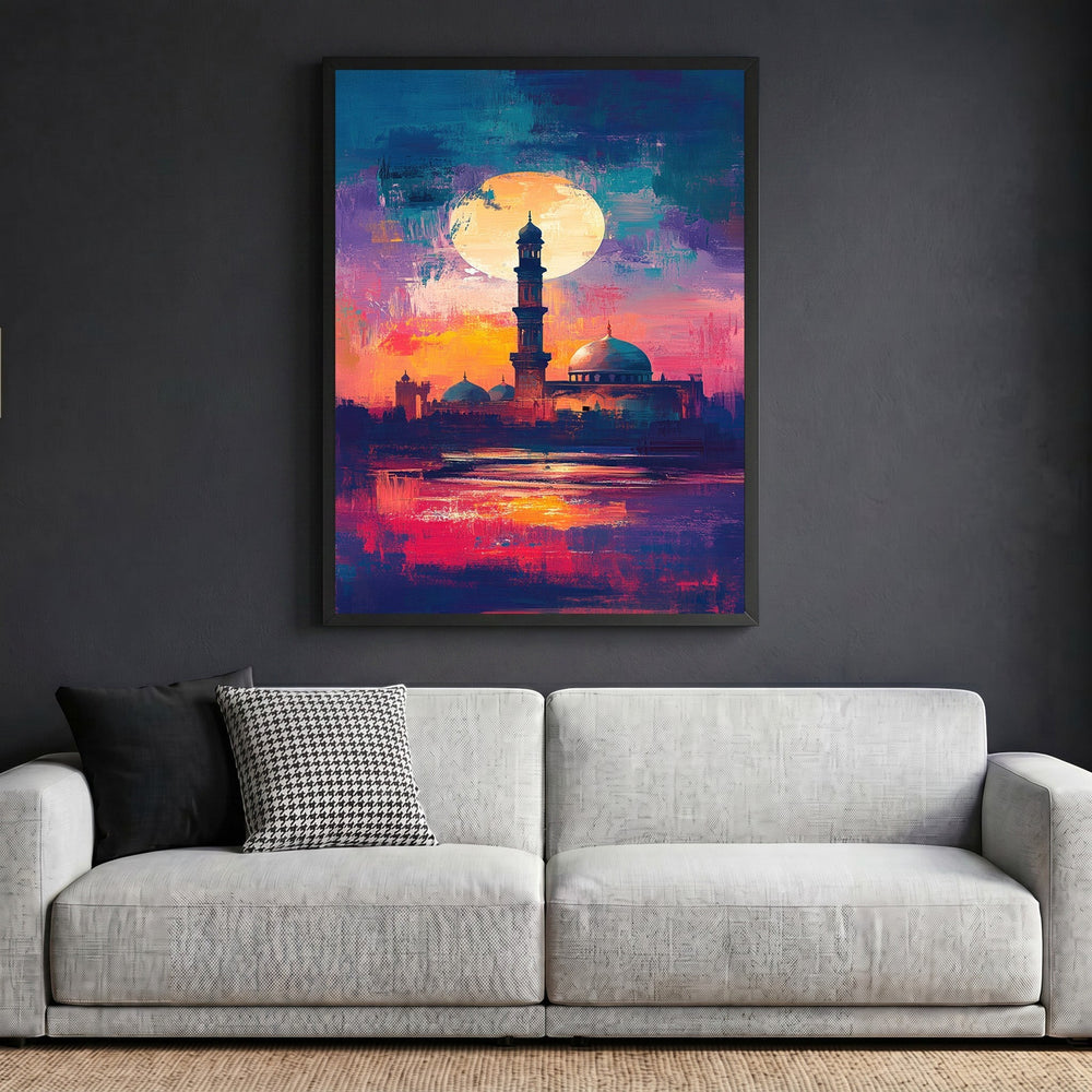 Wadi Home abstract mosque landscape wall art with vibrant sunset colors in a black frame above a modern grey sofa.