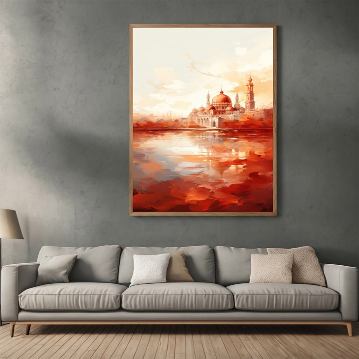 Wadi Home abstract mosque landscape wall art print with sunset orange and red tones hanging above a modern grey sofa.