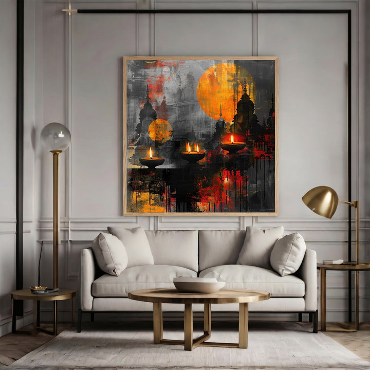 Wadi Home abstract canvas print featuring glowing oil lamps and sunset orange accents above a modern grey sofa.