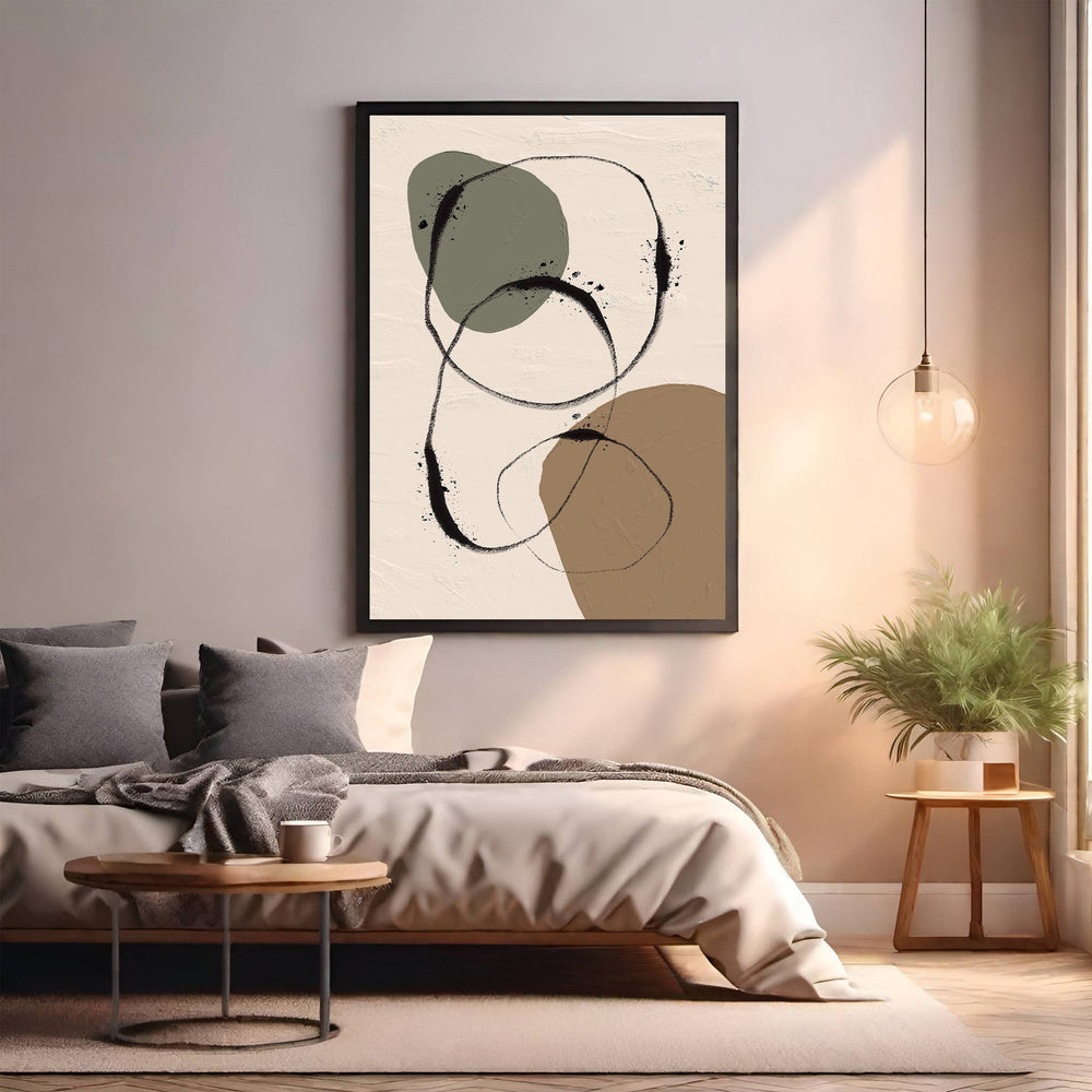 Wadi Home abstract organic shapes wall art with earthy tones and fluid lines in a black frame.