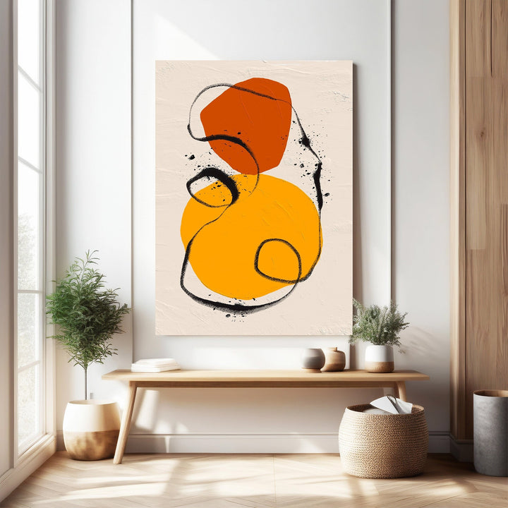 Wadi Home abstract wall art with orange and yellow circles and black brushstrokes on textured background.