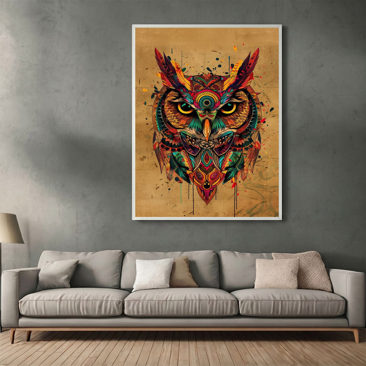 Wadi Home abstract owl wall art print with geometric patterns and vibrant colors hanging above a modern grey sofa.
