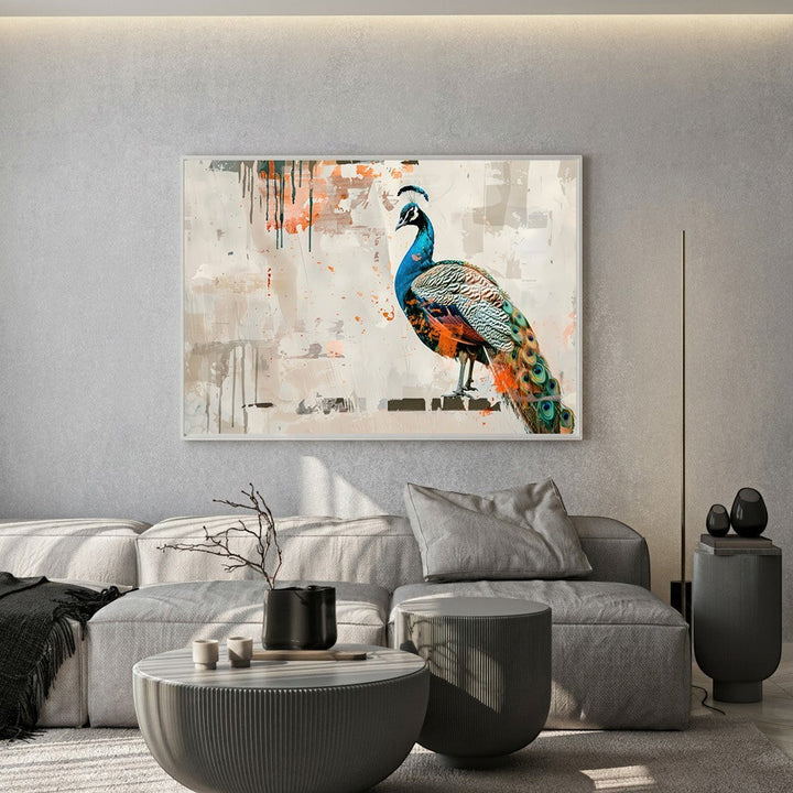 Wadi Home abstract peacock wall art print with vibrant blue and orange feathers hanging above a modern grey sofa.