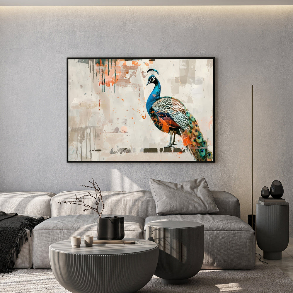 Wadi Home abstract peacock wall art print with vibrant blue and orange feathers hanging above a modern grey sofa.