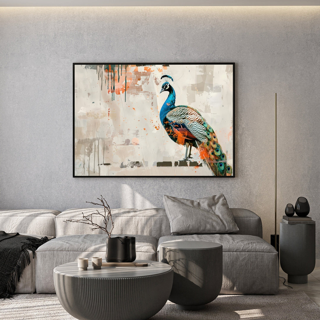 Wadi Home abstract peacock wall art print with vibrant blue and orange feathers hanging above a modern grey sofa.