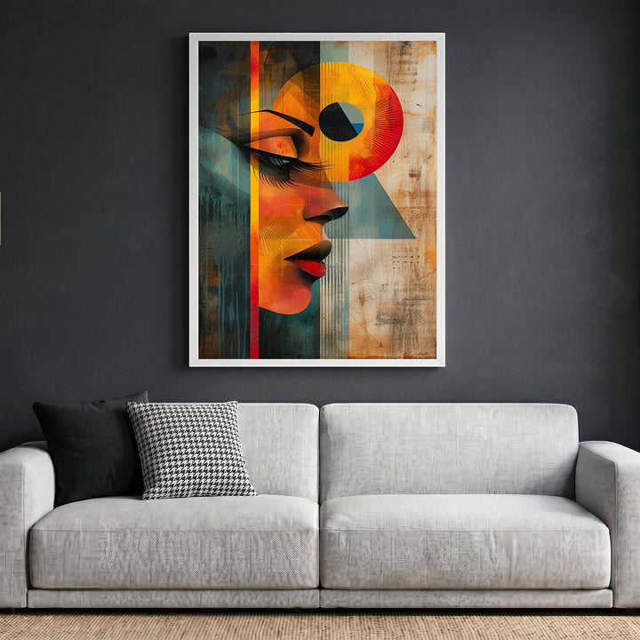 Wadi Home abstract portrait wall art in a white frame hanging above a modern grey sofa in a living room.