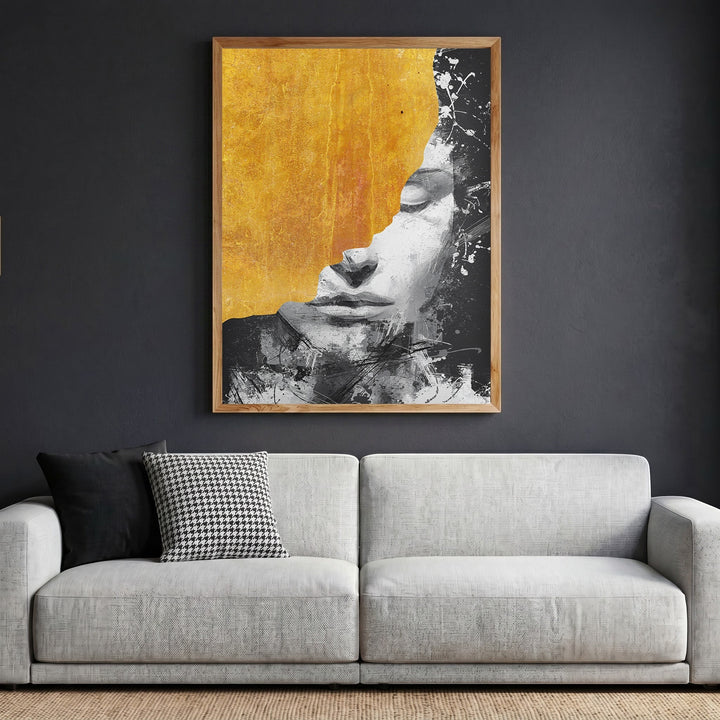 Wadi Home abstract portrait wall art print with charcoal and gold leaf textures in a wooden frame above a sofa.