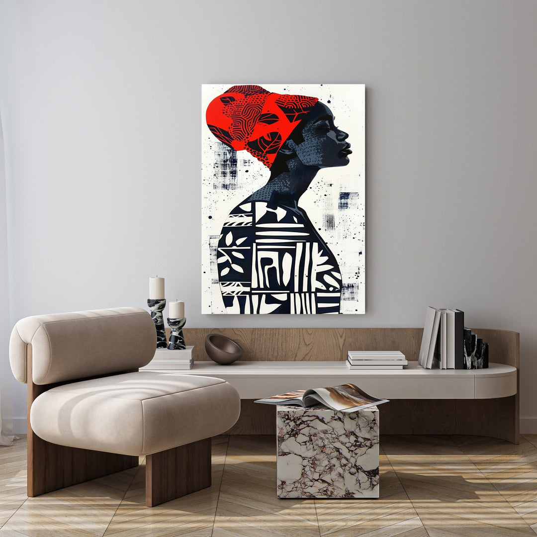 Wadi Home abstract wall art of a woman in profile wearing a red headwrap and patterned clothing. Monochromatic with red accent.