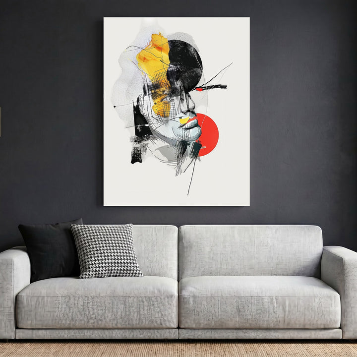 Wadi Home abstract portrait wall art print with charcoal lines and yellow and red accents above a modern grey sofa.
