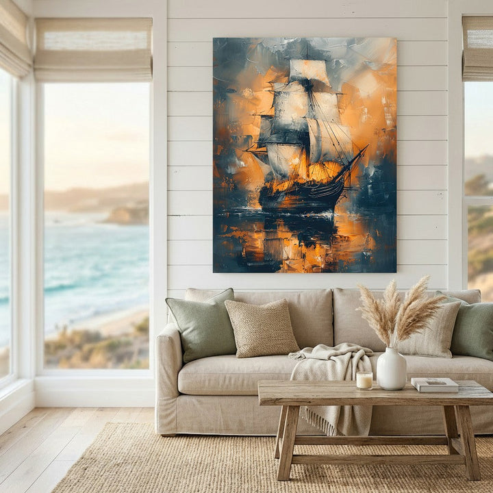 Wadi Home abstract sailing ship framed wall art with navy and amber sunset tones hanging above a neutral living room sofa.