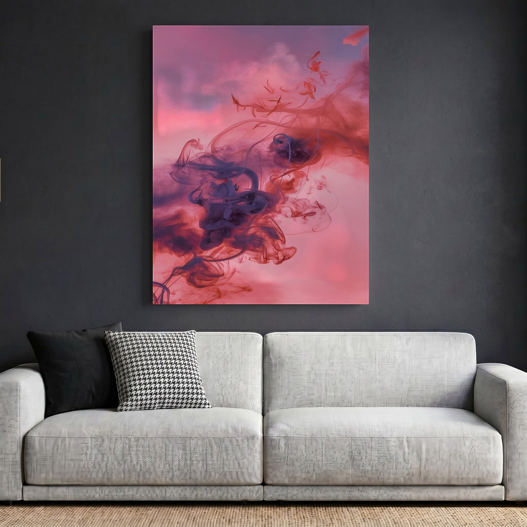 Wadi Home abstract smoke wall art print with violet and crimson swirls displayed above a modern grey sofa.