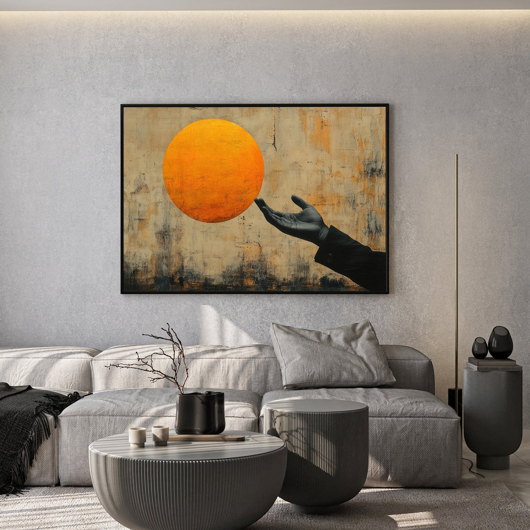 Wadi Home abstract wall art print featuring a hand reaching for a glowing sun in a modern living room setting.