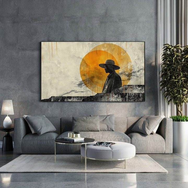 Wadi Home abstract wall art featuring a silhouette of a person in a hat against a textured orange sun and grey background.
