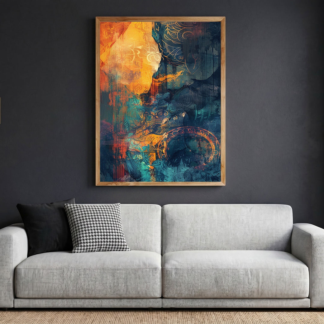 Wadi Home abstract wall art print with teal and orange brushstrokes in a wooden frame above a modern grey sofa.