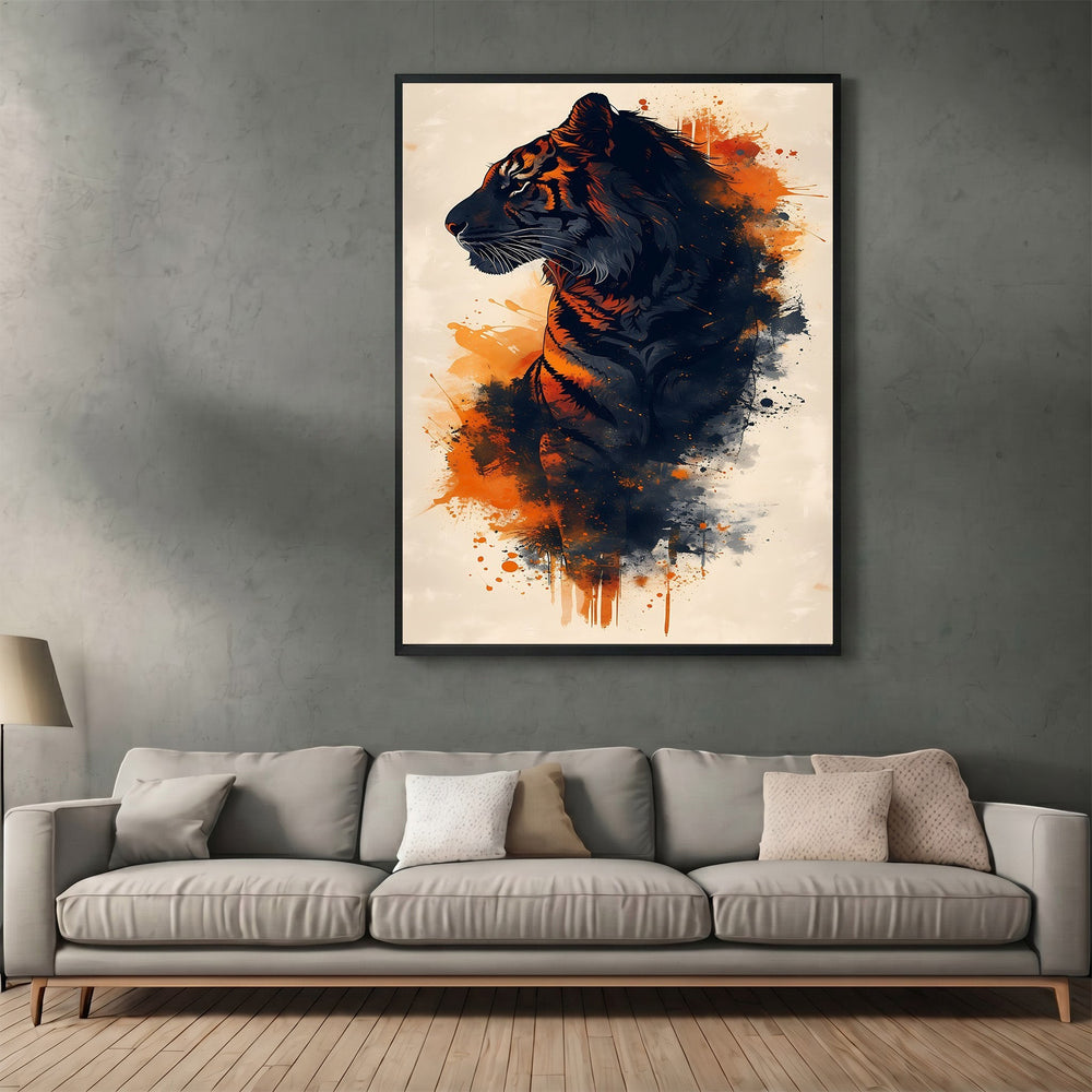 Wadi Home abstract tiger wall art print with charcoal and orange ink splatters hanging above a modern grey sofa.