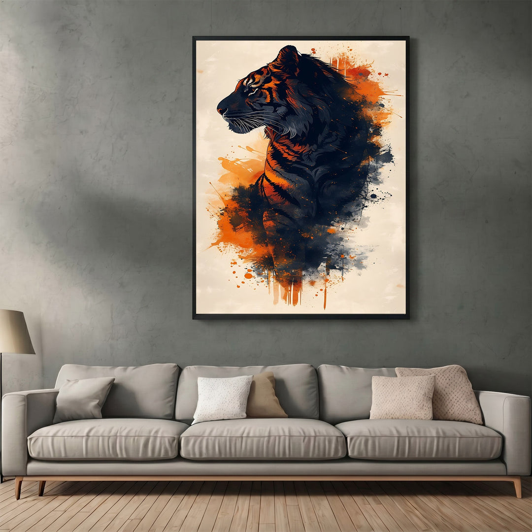 Wadi Home abstract tiger wall art print with charcoal and orange ink splatters hanging above a modern grey sofa.