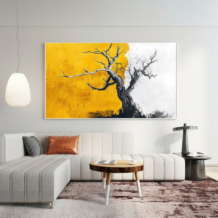 Wadi Home abstract tree landscape canvas print with golden-yellow, white, and charcoal tones in a modern living room.