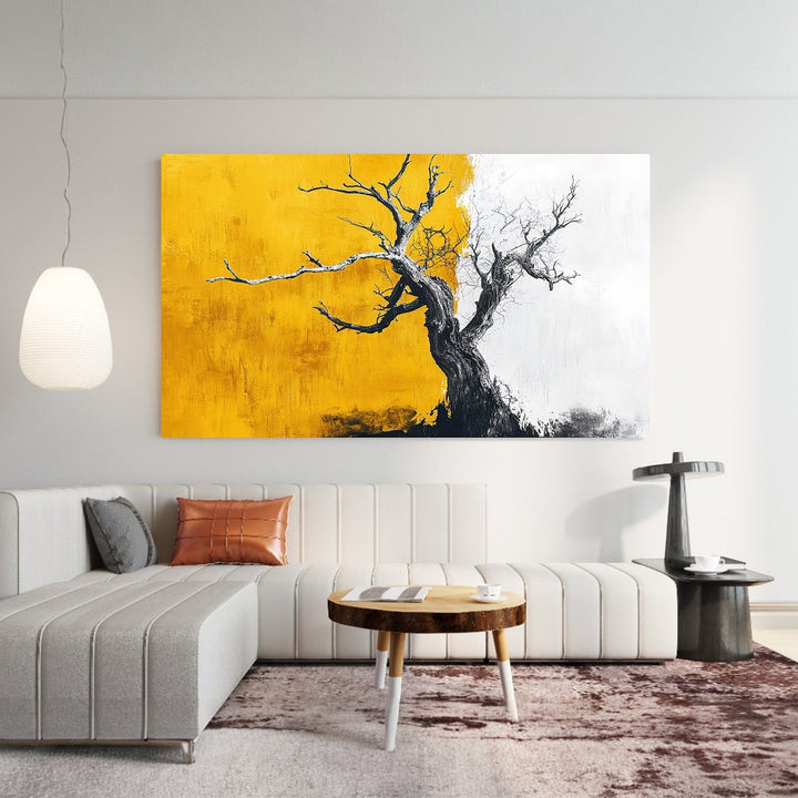 Wadi Home abstract tree landscape canvas print featuring golden yellow and charcoal tones above a modern sofa.