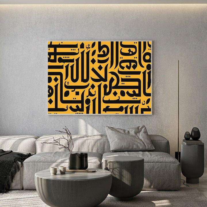 Wadi Home modern Arabic calligraphy canvas print featuring bold black script on a gold background in a living room.