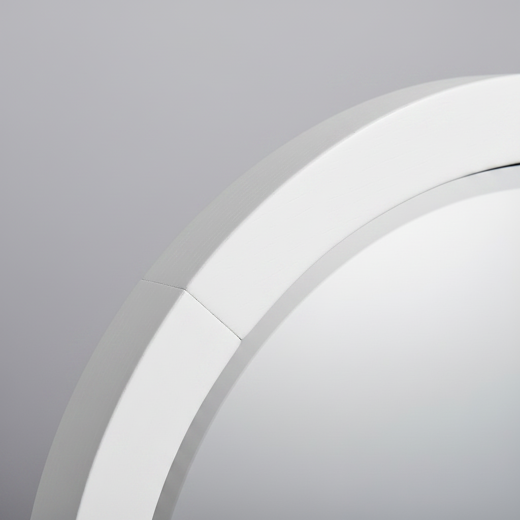 Close-up of the Wadi Home arched floor mirror featuring a smooth white wooden frame and high-clarity glass.