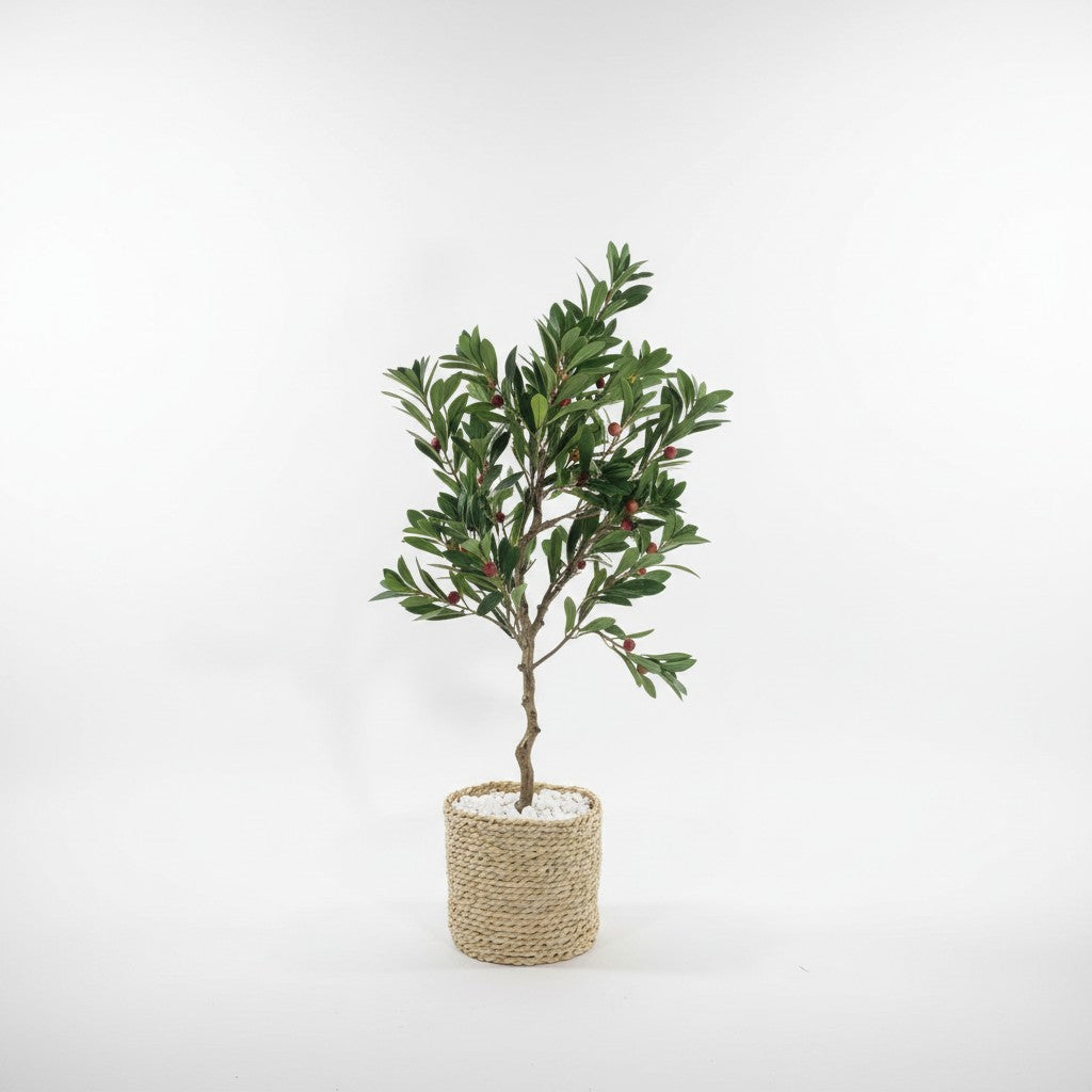 Wadi Home artificial bayberry tree with green leaves and small red berries in a textured woven basket planter