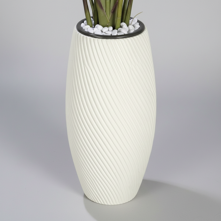 Wadi Home artificial Bird of Paradise plant in a tall textured white swirling floor vase with decorative stones