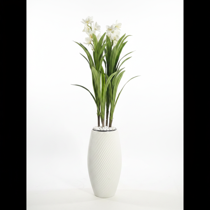 Wadi Home artificial dracaena plant with white flowers in a textured white spiral-ribbed floor vase with stone base