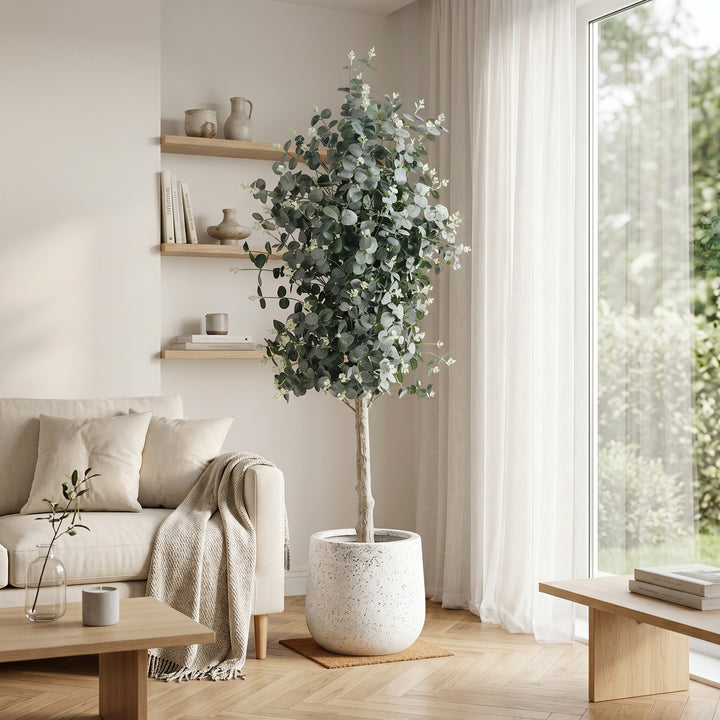 Wadi Home Artificial Eucalyptus Tree with silvery-green leaves and white buds in a textured pot.