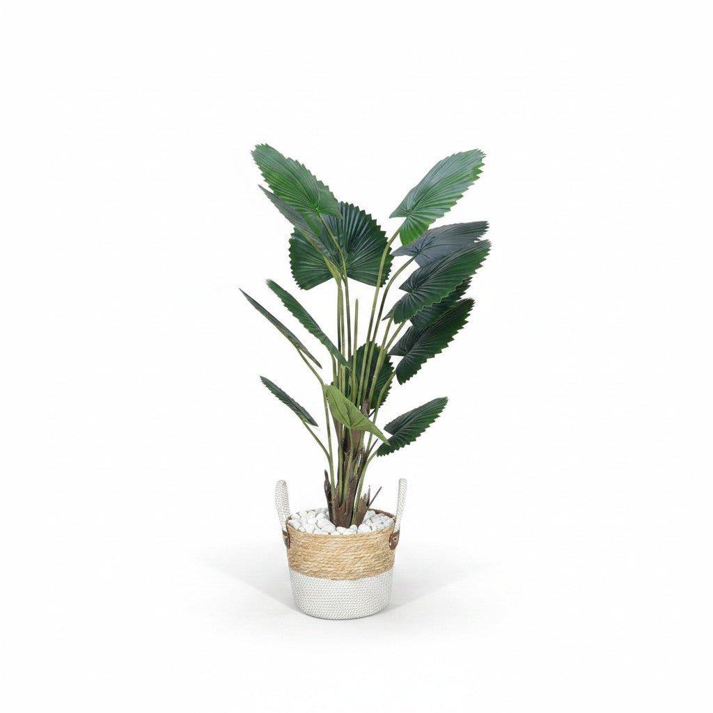 Wadi Home artificial fan palm plant with deep green leaves in a two-toned woven basket with white decorative stones