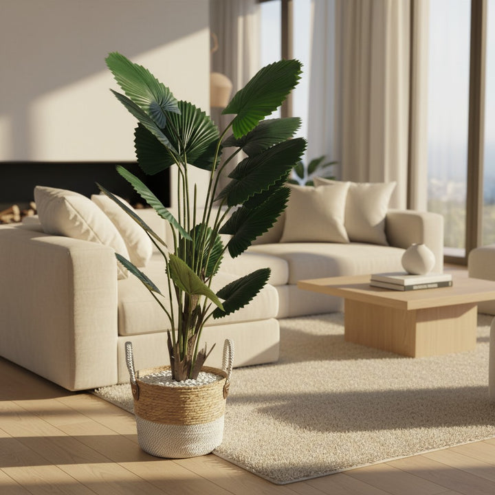 Wadi Home artificial fan palm plant with deep green leaves in a two-toned woven basket with white stone base