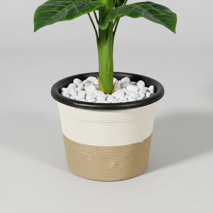 Wadi Home artificial fiddle leaf fig plant in a two-tone textured planter with decorative white stones