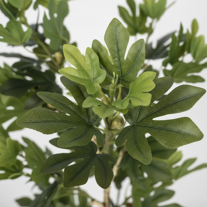 Wadi Home artificial fig tree with lush deep green foliage and intricate leaf detailing for home decor