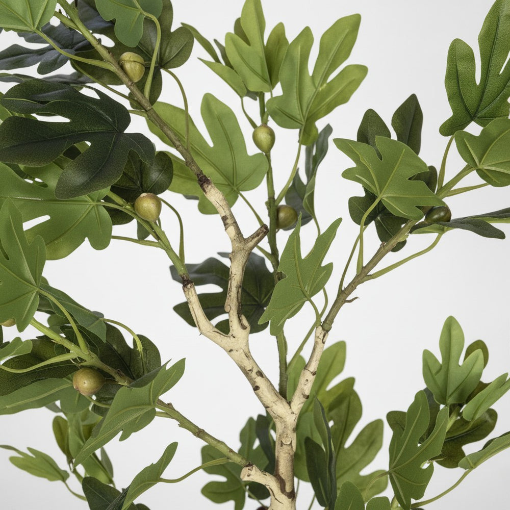 Wadi Home artificial fig tree branches with realistic green leaves and small fruit on a textured light-colored trunk