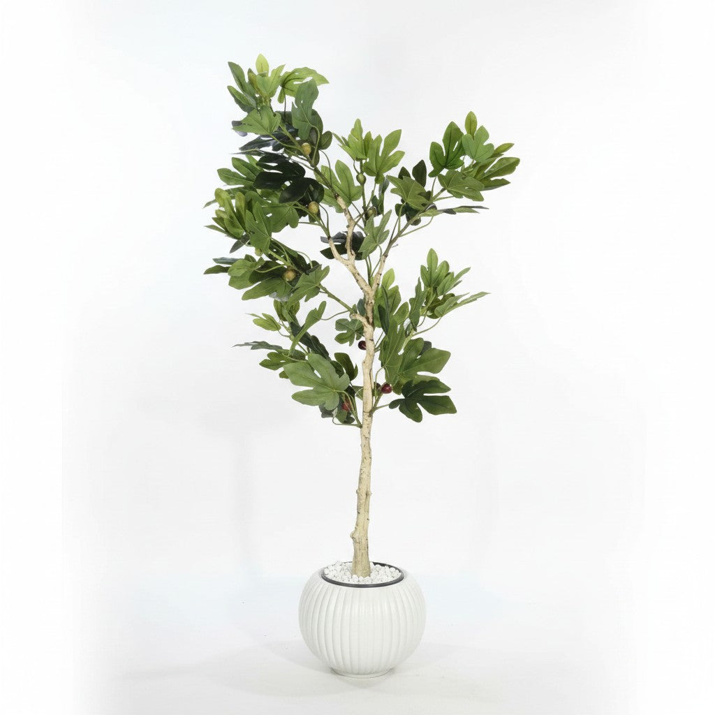 Wadi Home artificial fig tree with vibrant green leaves and fruit in a ribbed white planter with decorative pebbles.