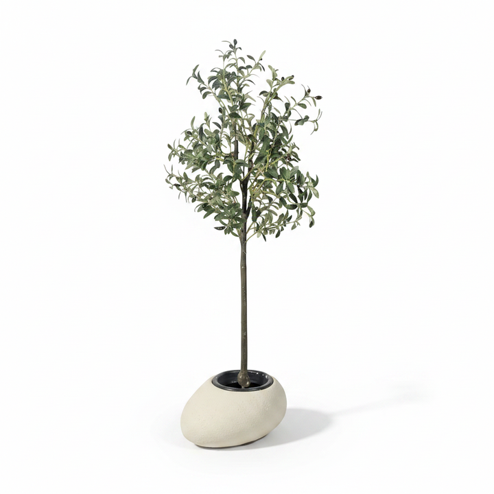 Wadi Home artificial olive tree with silvery-green leaves in a smooth white stone-shaped pot on a white background