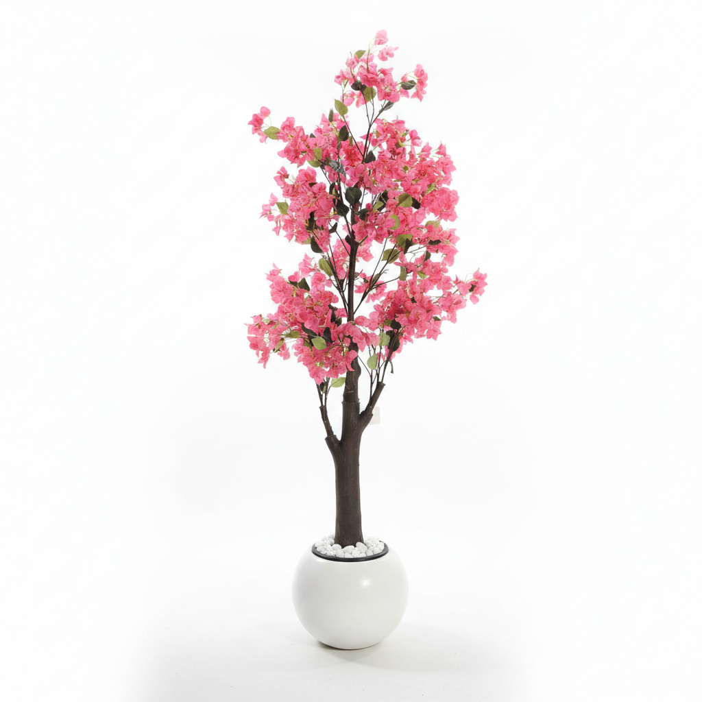 Wadi Home artificial bougainvillea tree with vibrant pink flowers in a modern white spherical planter with pebbles.