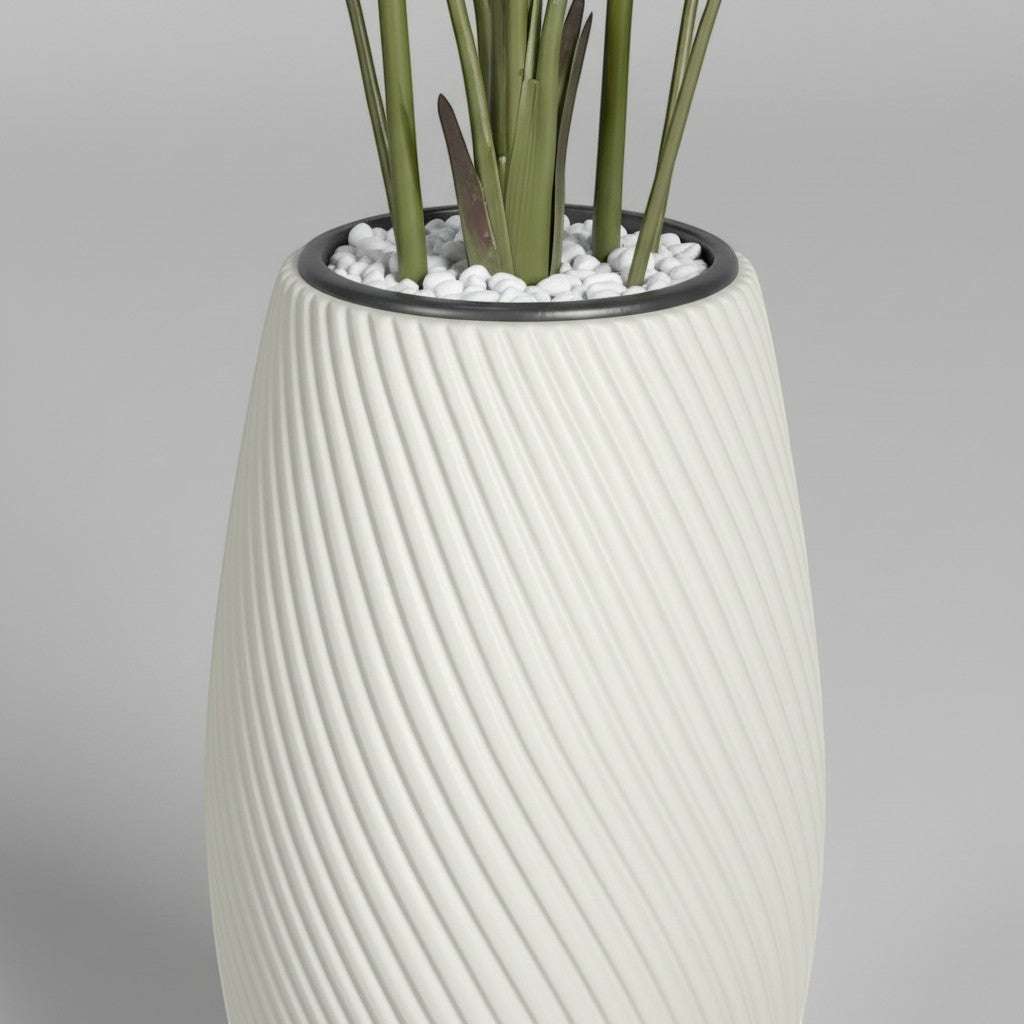 Wadi Home artificial Bird of Paradise plant in a white textured spiral planter with decorative white pebbles