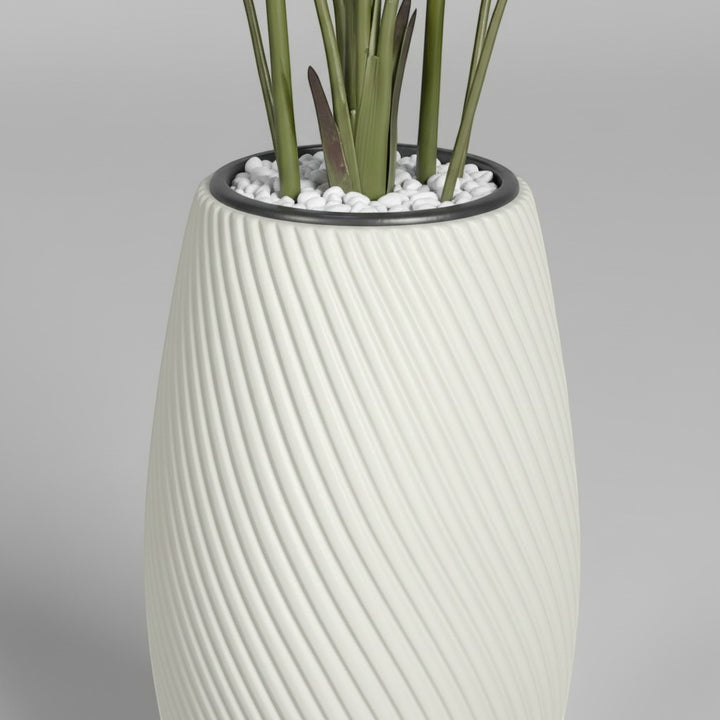 Wadi Home artificial Bird of Paradise plant in a white textured spiral planter with decorative white pebbles
