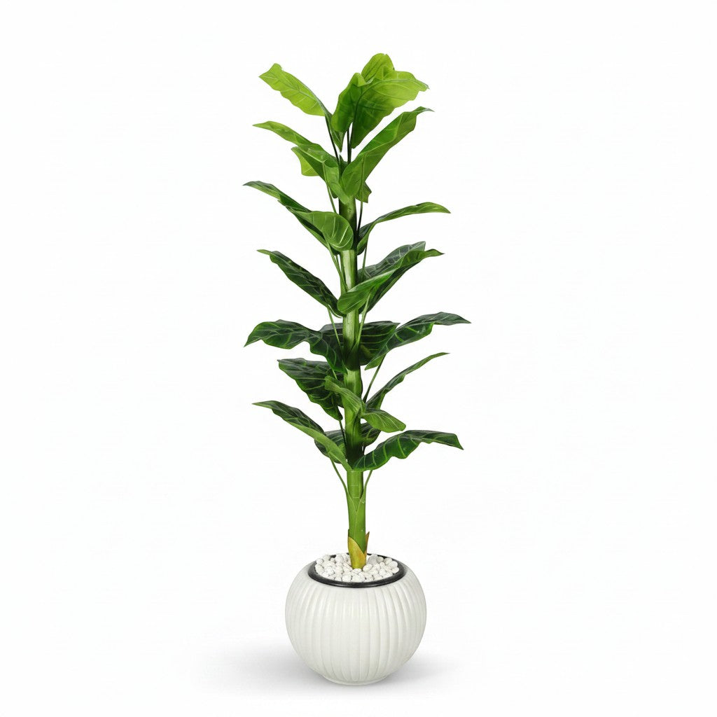 Wadi Home artificial floor plant with lush green leaves in a white ribbed decorative planter with pebble top layer
