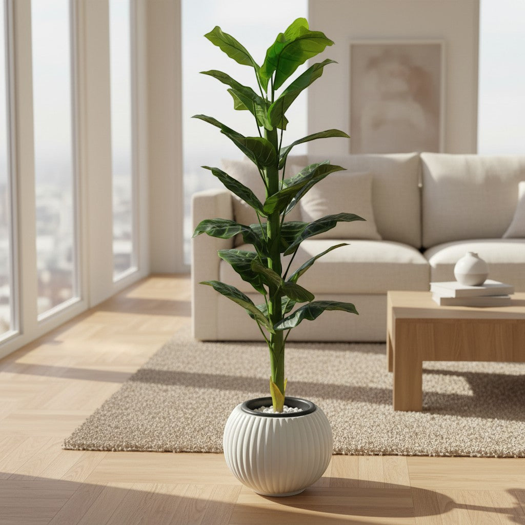 Wadi Home artificial floor plant with lush green leaves in a white ribbed decorative planter on a living room floor.