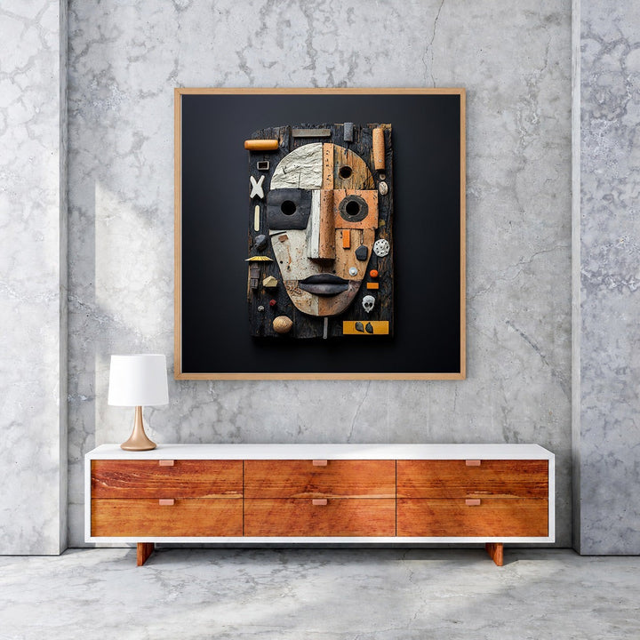 Wadi Home Assemblage Face Wall Art, a textured mixed-media sculpture with reclaimed wood, metal, and found objects in neutral tones with rust and ochre accents.