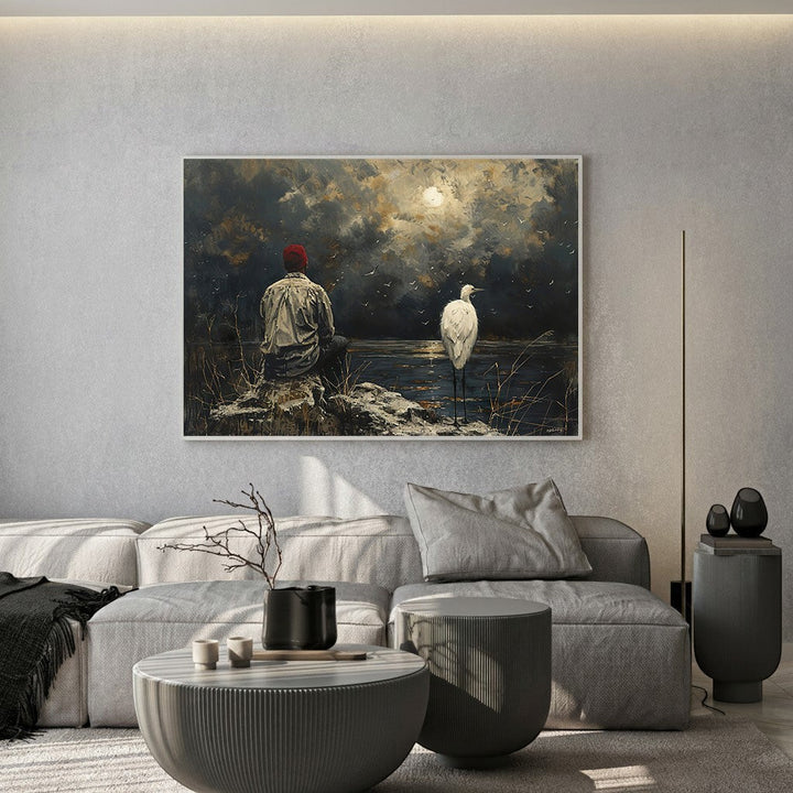 Wadi Home atmospheric landscape wall art print featuring a person and heron by a moonlit lake in a modern living room.