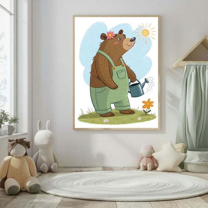 Wadi Home framed nursery art of a brown bear in green overalls watering a flower under a sunny sky.
