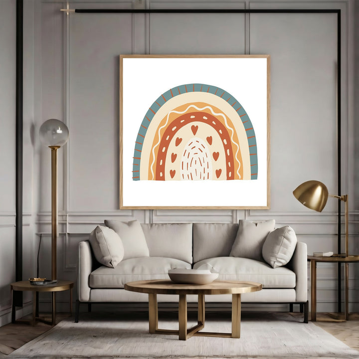 Wadi Home boho rainbow wall art print with heart motifs in terracotta, cream, and teal hanging above a modern sofa.
