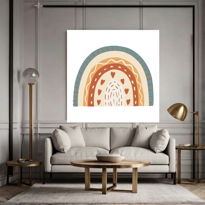 Wadi Home boho rainbow wall art print with terracotta, cream, and teal heart motifs displayed above a modern sofa.