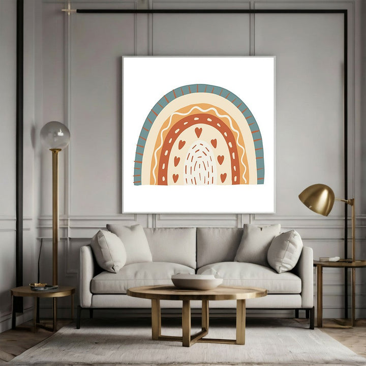 Wadi Home boho rainbow wall art print with heart motifs in terracotta, cream, and teal hanging above a modern sofa.