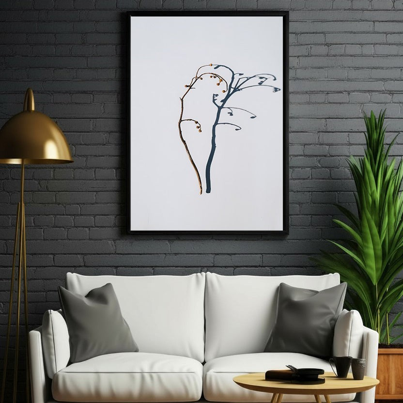 Wadi Home minimalist botanical branch wall art in brown and deep blue on white background.