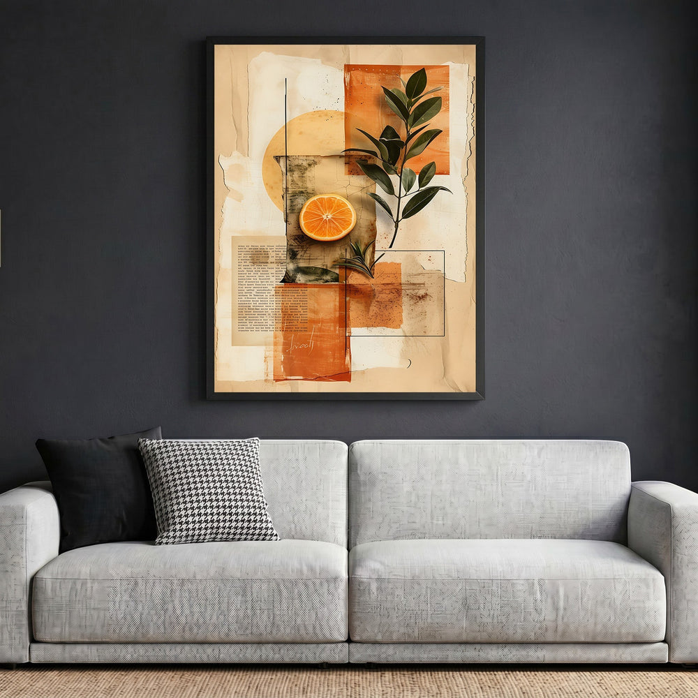 Wadi Home abstract botanical collage wall art featuring orange and foliage in a black frame above a modern grey sofa.