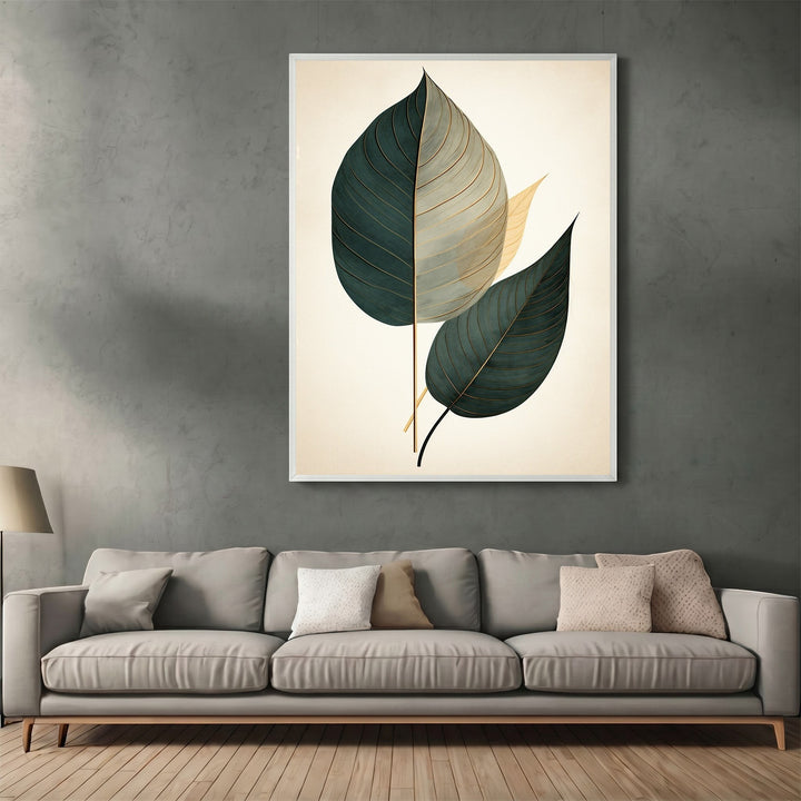 Wadi Home botanical leaf wall art print with teal and gold leaves on a cream background, displayed in a modern living room.