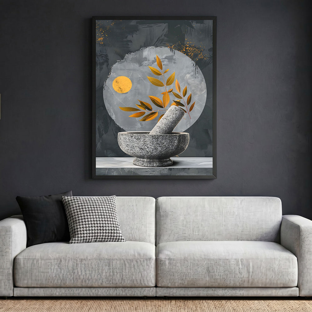 Wadi Home abstract botanical mortar and pestle wall art print with gold accents in a black frame above a grey sofa.